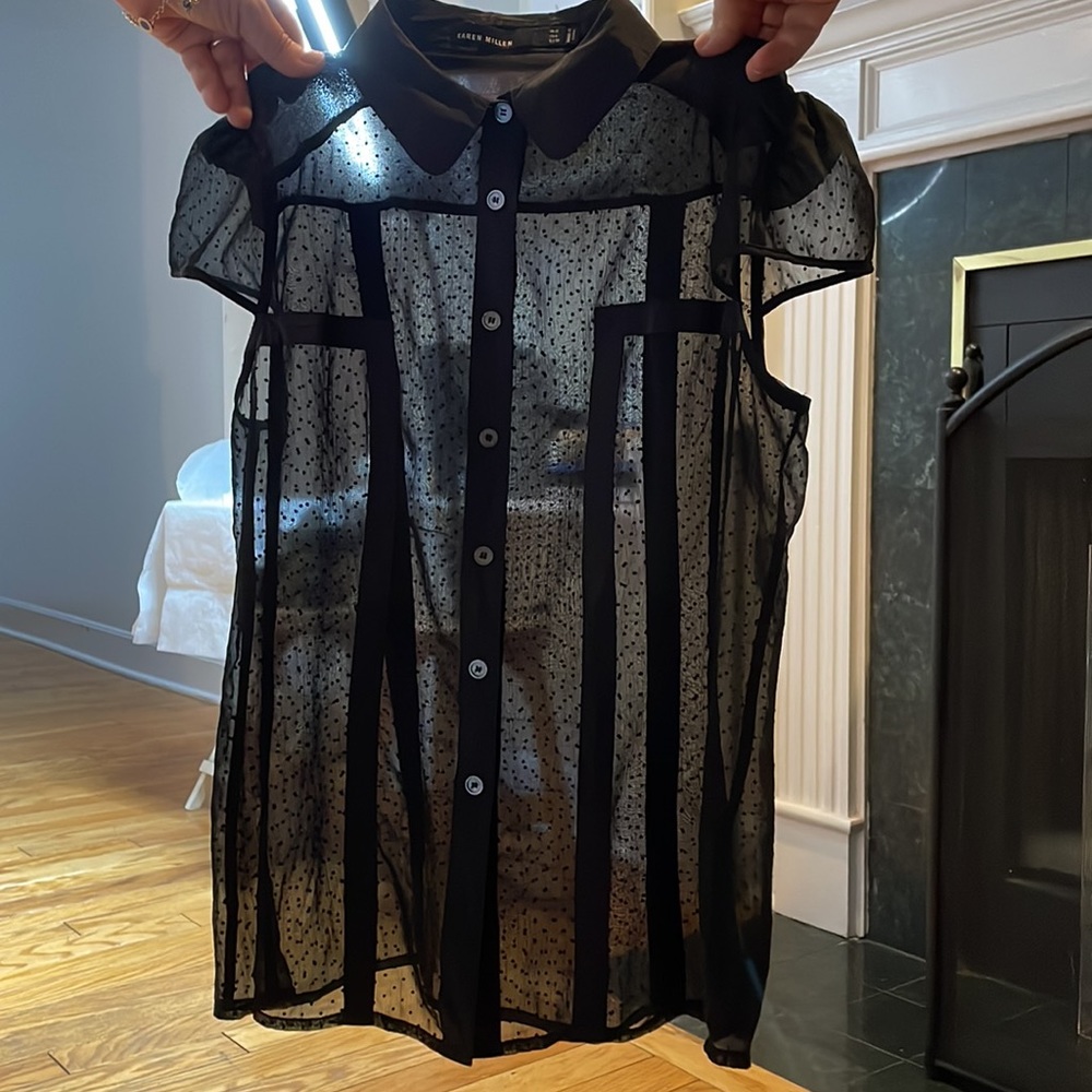 Sexy and classy black blouse.